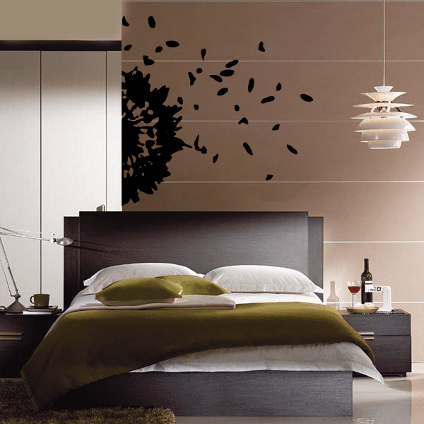Cozy bedroom with a dandelion wall decal above the headboard
