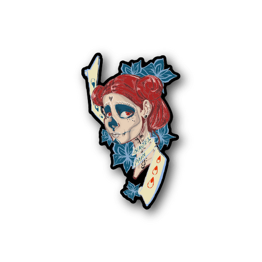 Day of the Dead girl vinyl sticker with red hair skull and blue floral accents
