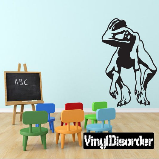 Crouching Dilophosaurus wall decal in black with white neck markings