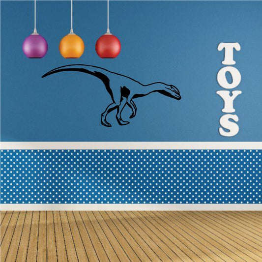 Dilophosaurus dinosaur decal with black outline and open-mouthed silhouette