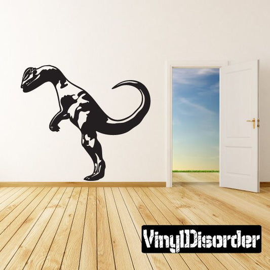 Black Dilophosaurus wall decal with open mouth and spots