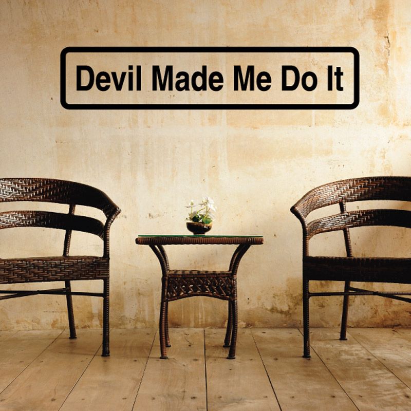 Vinyl wall decal with 'Devil Made Me Do It' in black outlined lettering