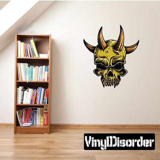 Devil skull wall decal with yellow-and-black horned face and stylized grinning mouth