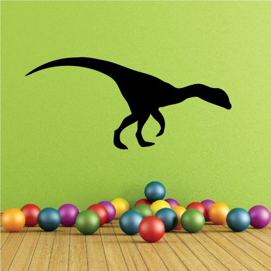 Black Dilophosaurus dinosaur decal silhouette with head frill and open mouth