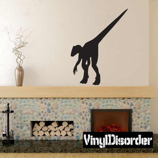 Black Dilophosaurus walking away wall decal silhouette
