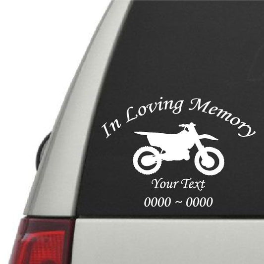 Dirt bike memorial decal with white text and bike silhouette on dark background