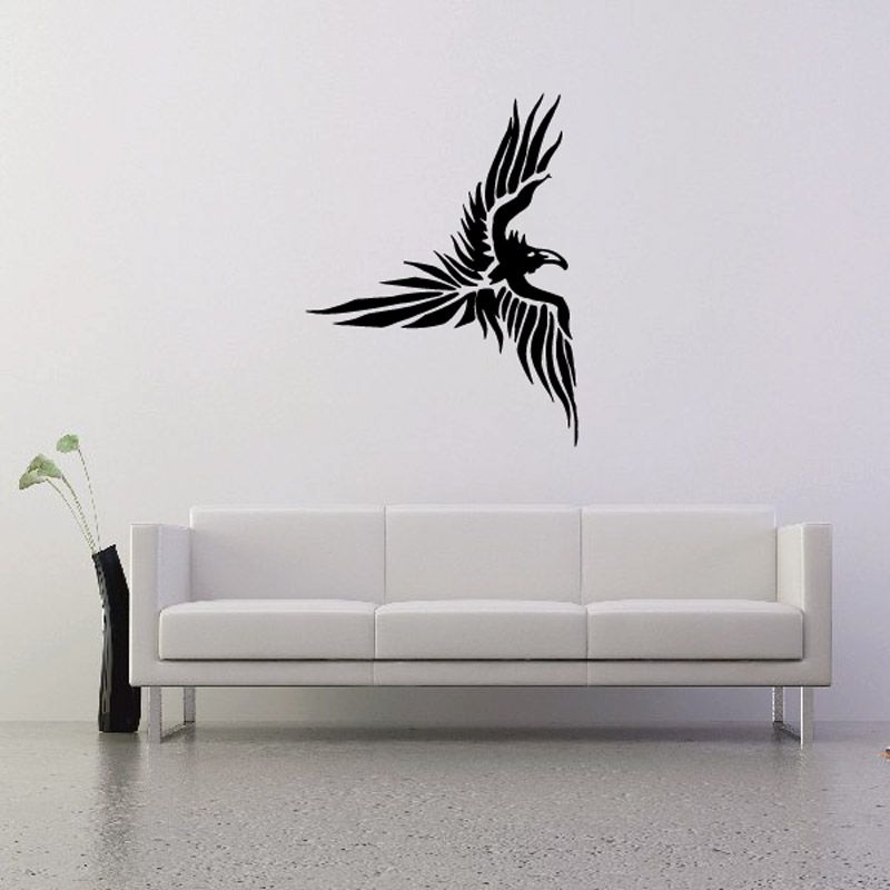 Flying eagle vinyl wall decal with sharp black feathered wings and beak