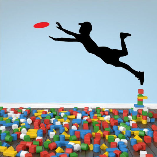 Diving Fisbee Catch Decal: black diver silhouette reaching for a red frisbee.