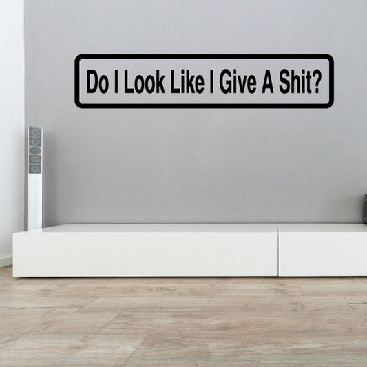 Black-and-white wall decal with bold quote text: Do I look like I give a Shit?