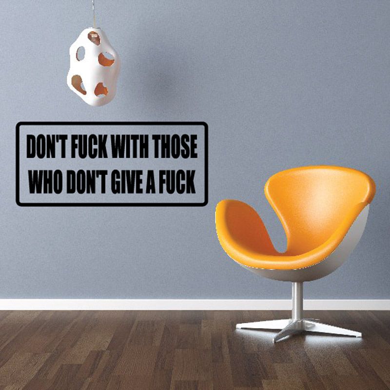 Black rectangular wall decal with bold white text: DON’T FUCK WITH THOSE WHO DON’T GIVE A FUCK