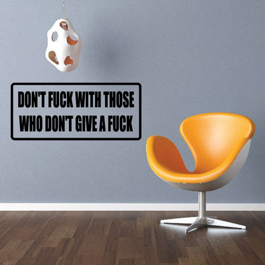 Black rectangular wall decal with bold white text: DON’T FUCK WITH THOSE WHO DON’T GIVE A FUCK