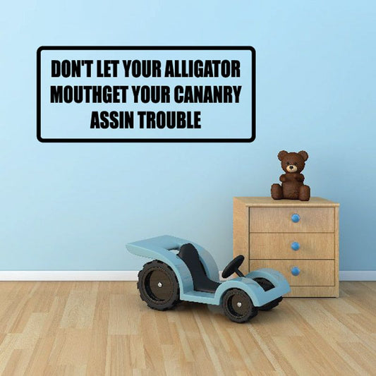 Rectangular vinyl wall decal with bold uppercase alligator and canary text.