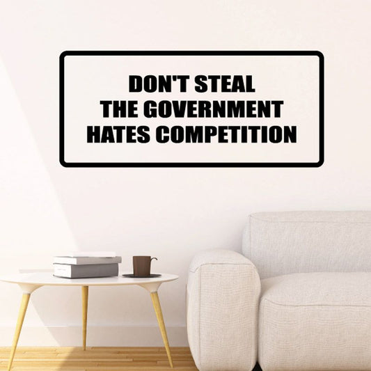 Don't steal the government hates competition decal, black text in white outlined rectangle