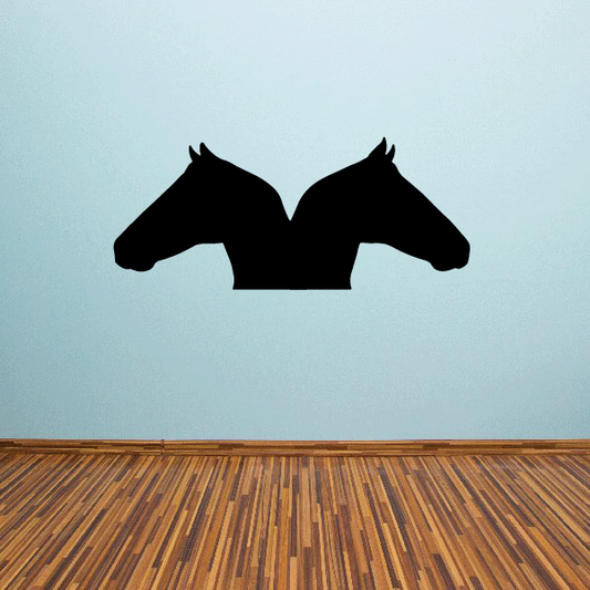 Double horse silhouette decal with two black horse heads facing each other
