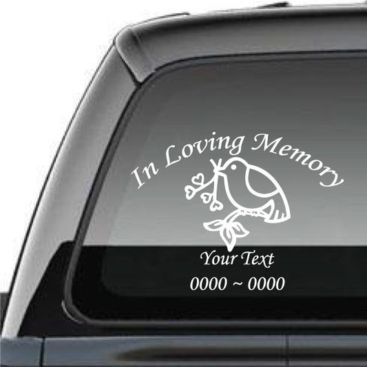 Window decal: white dove, hearts branch, and 'In Loving Memory' text