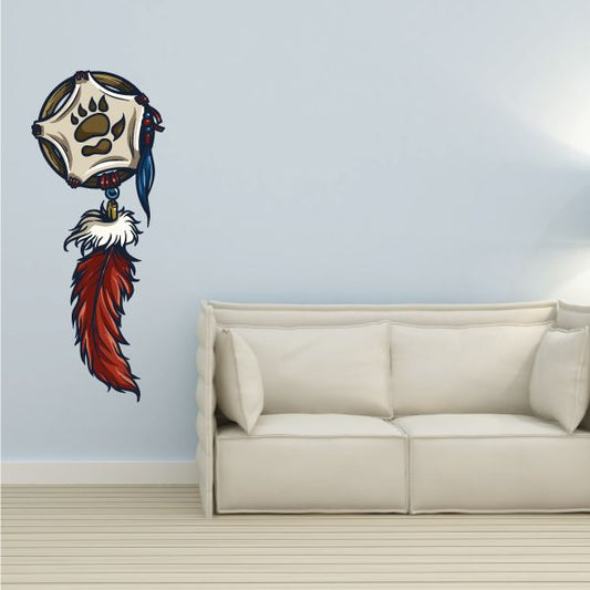 Dream catcher sticker with skull face and blue ribbon, red and white feather
