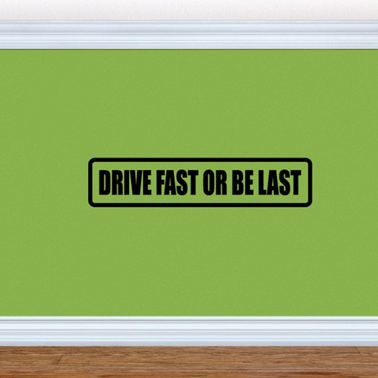 Black-bordered car decal reading 'Drive fast or be last'.