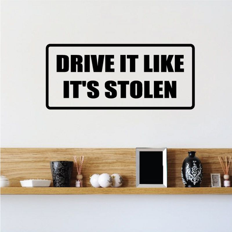 Car decal with bold black text: “DRIVE IT LIKE IT’S STOLEN”