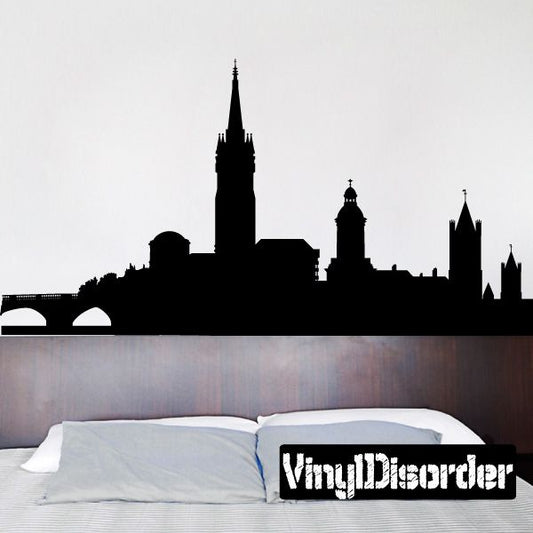 Black skyline wall decal with spires and church silhouettes