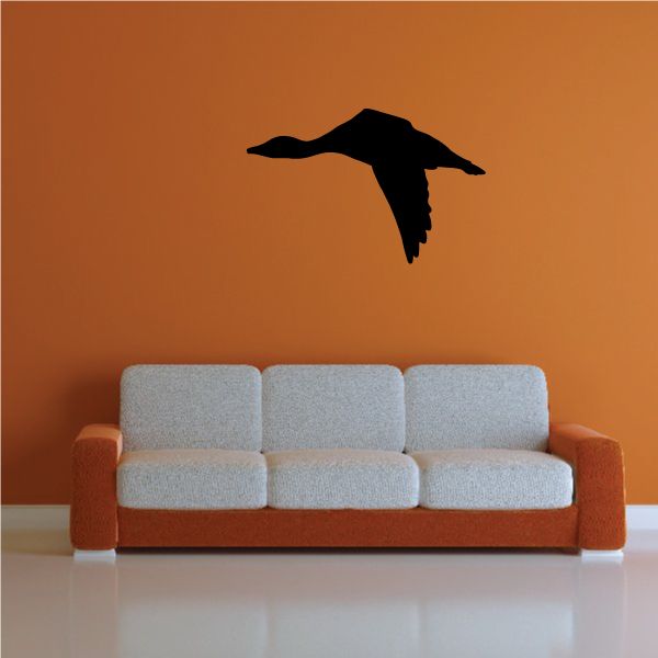 Duck wall decal in solid black vinyl, featuring a flying duck silhouette