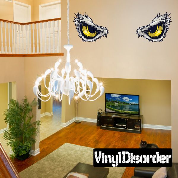 Eagle predator eyes sticker with two yellow, blue, stylized bird eyes