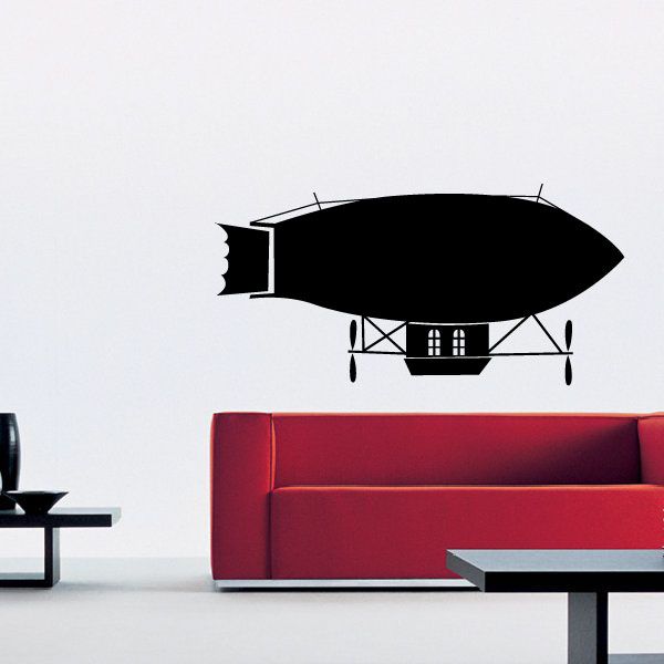 Black blimp airship wall decal with windowed cabin and striped base