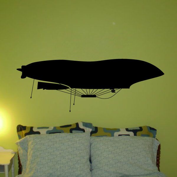 Black zeppelin wall decal with visible frame lines and propellers