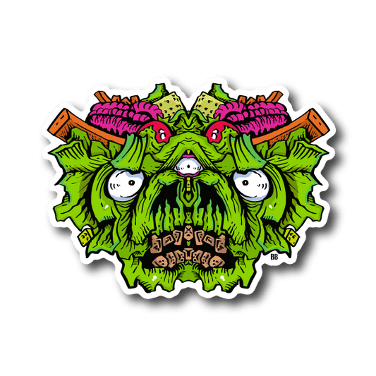 Vinyl sticker of a green monster face with purple hair and white eyes