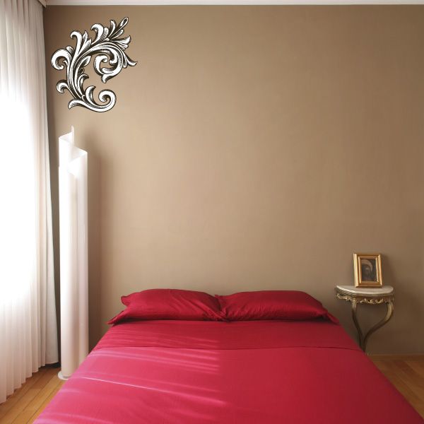 Ornate gold scrollwork wall decal with symmetrical floral corner design
