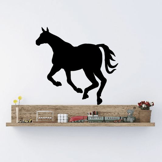 Black escaping horse silhouette decal with raised legs and flowing tail