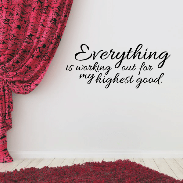 Wall decal with black cursive quote: “Everything is working out for my highest good.”