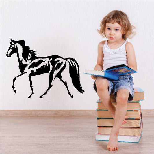 Horse wall decal in black, expressive standing silhouette with flowing mane
