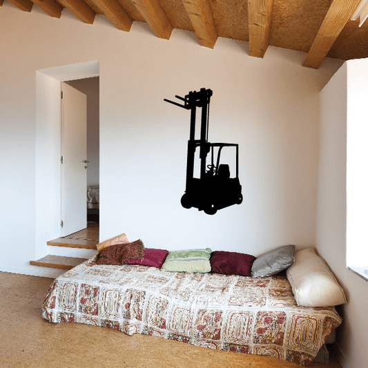 Forklift decal sticker with black forklift silhouette on a light wall