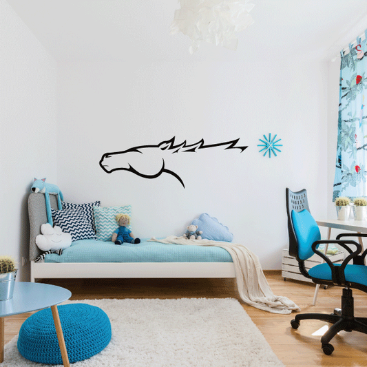 Horse head decal outline with blue starburst, extending across wall