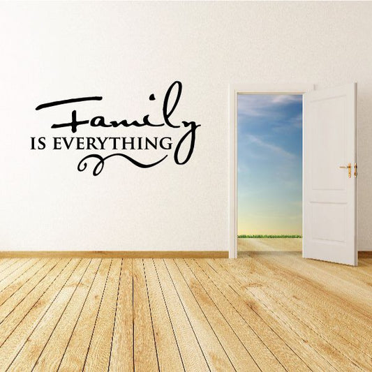 Black cursive wall decal with “Family” script and “IS EVERYTHING” lettering