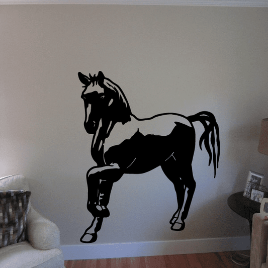 Black horse pose wall decal with raised leg and flowing mane