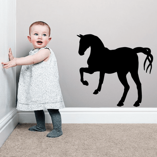 Black walking horse silhouette wall decal with detailed mane and legs