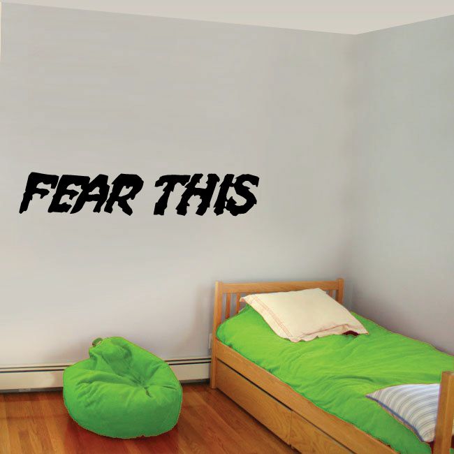 Wall decal with bold black graffiti-style text reading FEAR THIS