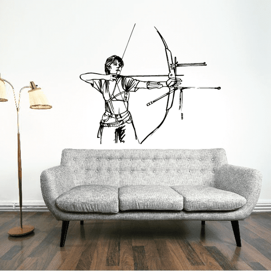 Female archer wall decal, black line art of archer drawing a bow above sofa