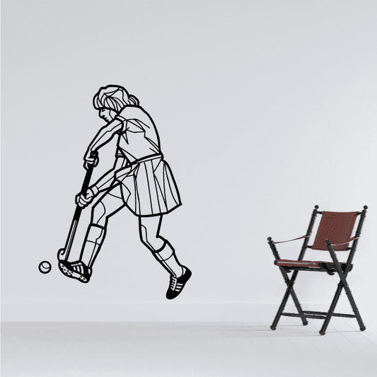 Field hockey player decal: female athlete swinging stick, ball near foot, line-art style.