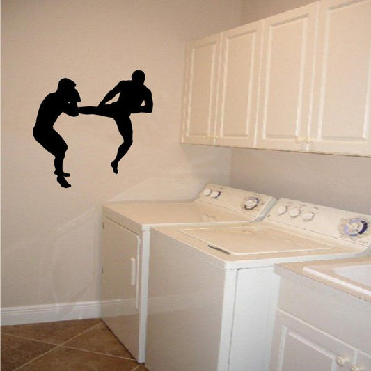 Fighting wall decal with two black silhouette boxers in a sparring stance
