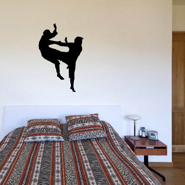 Fighting combat wall vinyl decal with black silhouette in kick stance
