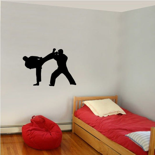 Fighting wall decal vinyl, black silhouette of two fighters in action on wall