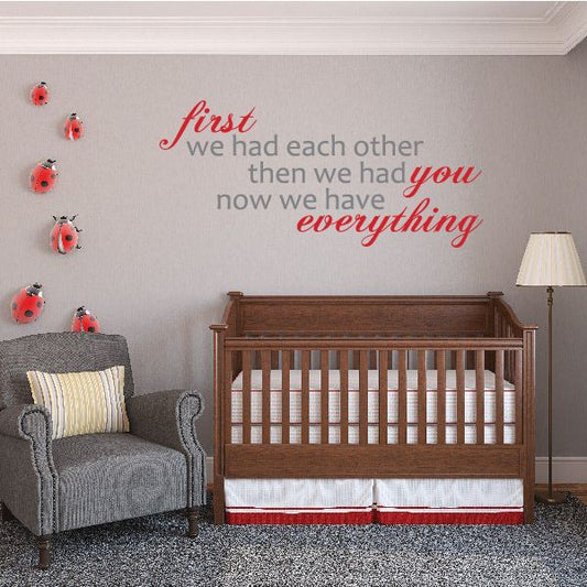 Printed die cut wall decal with text 'first we had each other' and red ladybugs