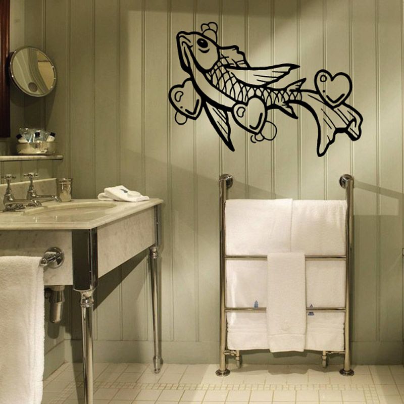Fish wall decal with black line-art of a swimming fish and heart details