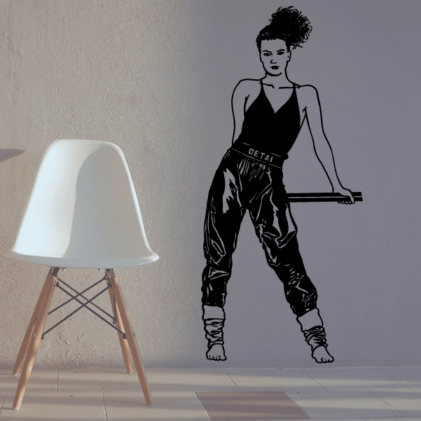 Black fitness wall decal of an athlete in a squat workout pose, arms extended