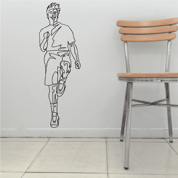 Fitness wall decal vinyl of a jogging man outline, monochrome
