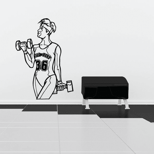 Fitness wall decal of outlined woman holding a dumbbell, black vinyl outline.