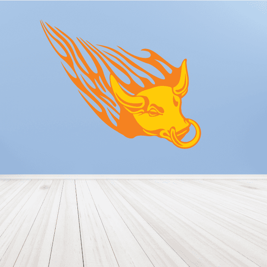 Flame bull head sticker in bright orange and yellow with curled horns