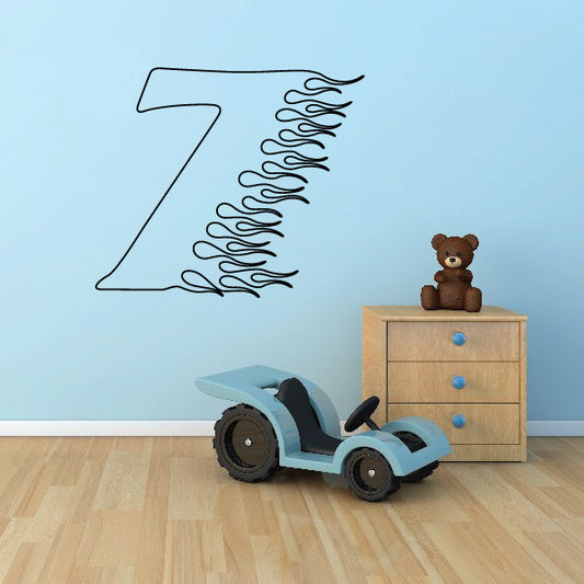 Vinyl decal of flaming number 7 in dark outline with flame trail
